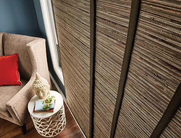 vertical window shades in contemporary living room with wide windows